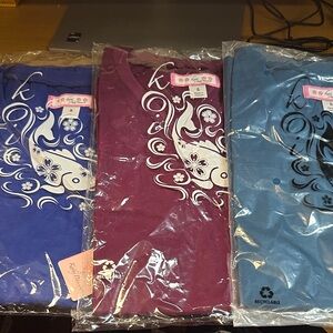 Koi Women's Tops in Galaxy, Wine, and Caribbean Blue